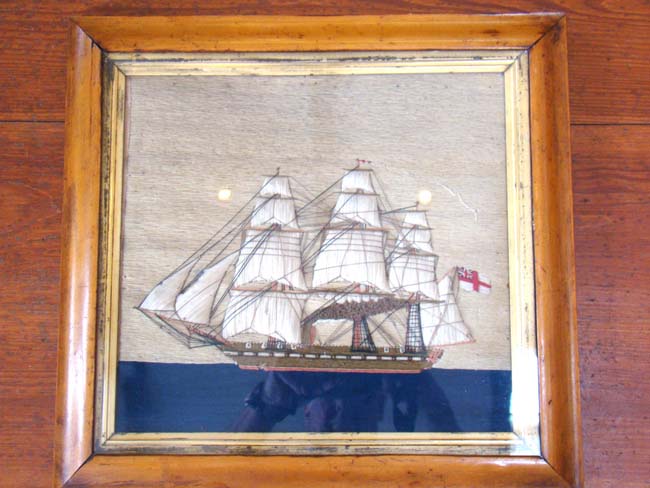A charming 19th century sailor-made woolwork picture of a British steam and sail ship circa 1865 in what appears to be its' original frame. — image 2